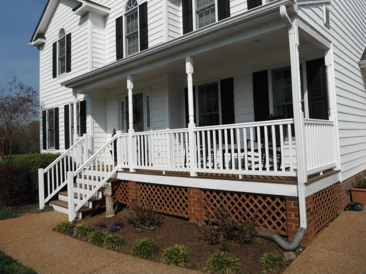 Before and after photos of new composite vinyl front porch railings in